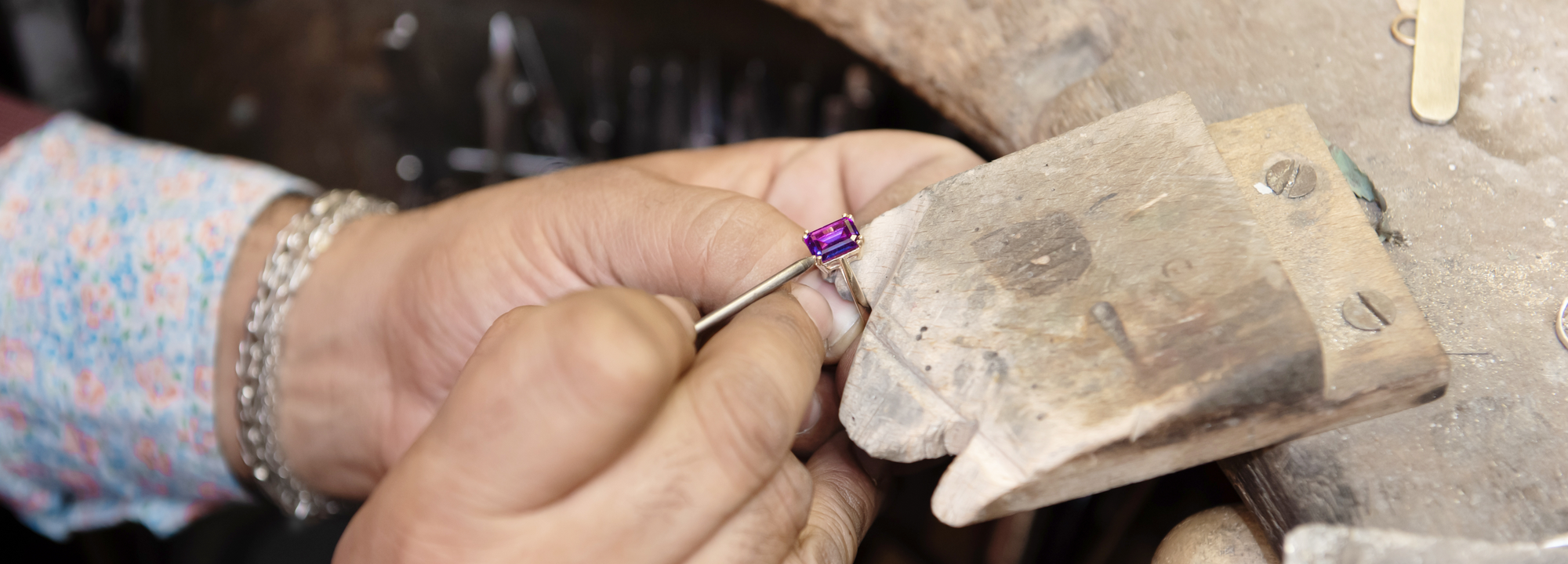 Jeweller making Amethyst ring